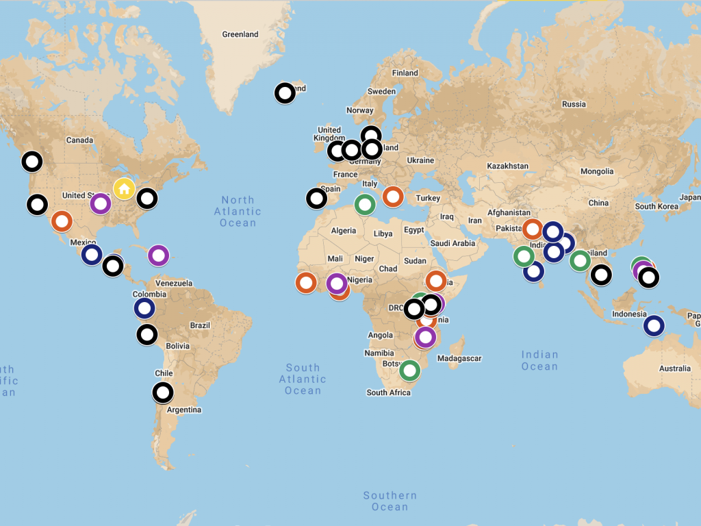 world map with colored dots showing locations of student teams
