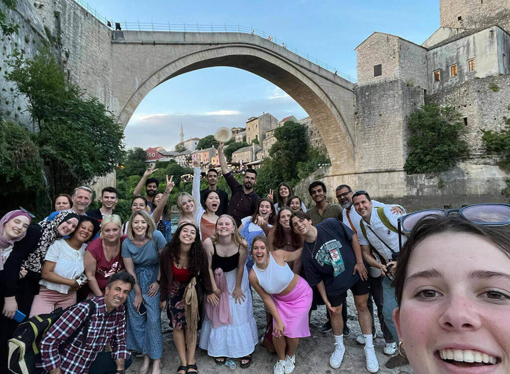 notre dame and bosnian students pose for group photo