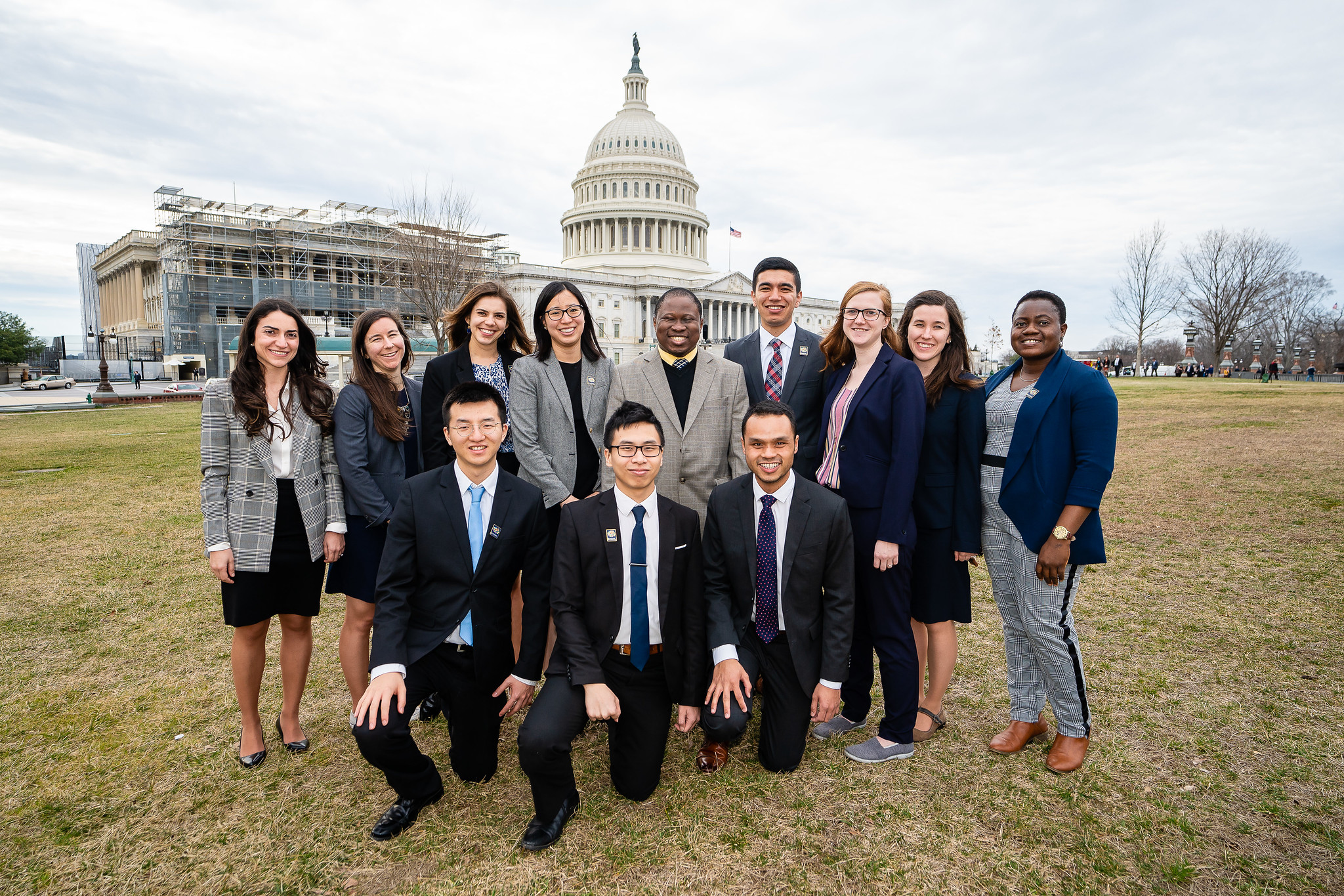 Group of master of global affairs students standing in front of the US Capitol.