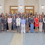 group photo of 42 master of global affairs students with Marilyn Keough dean Mary Gallagher